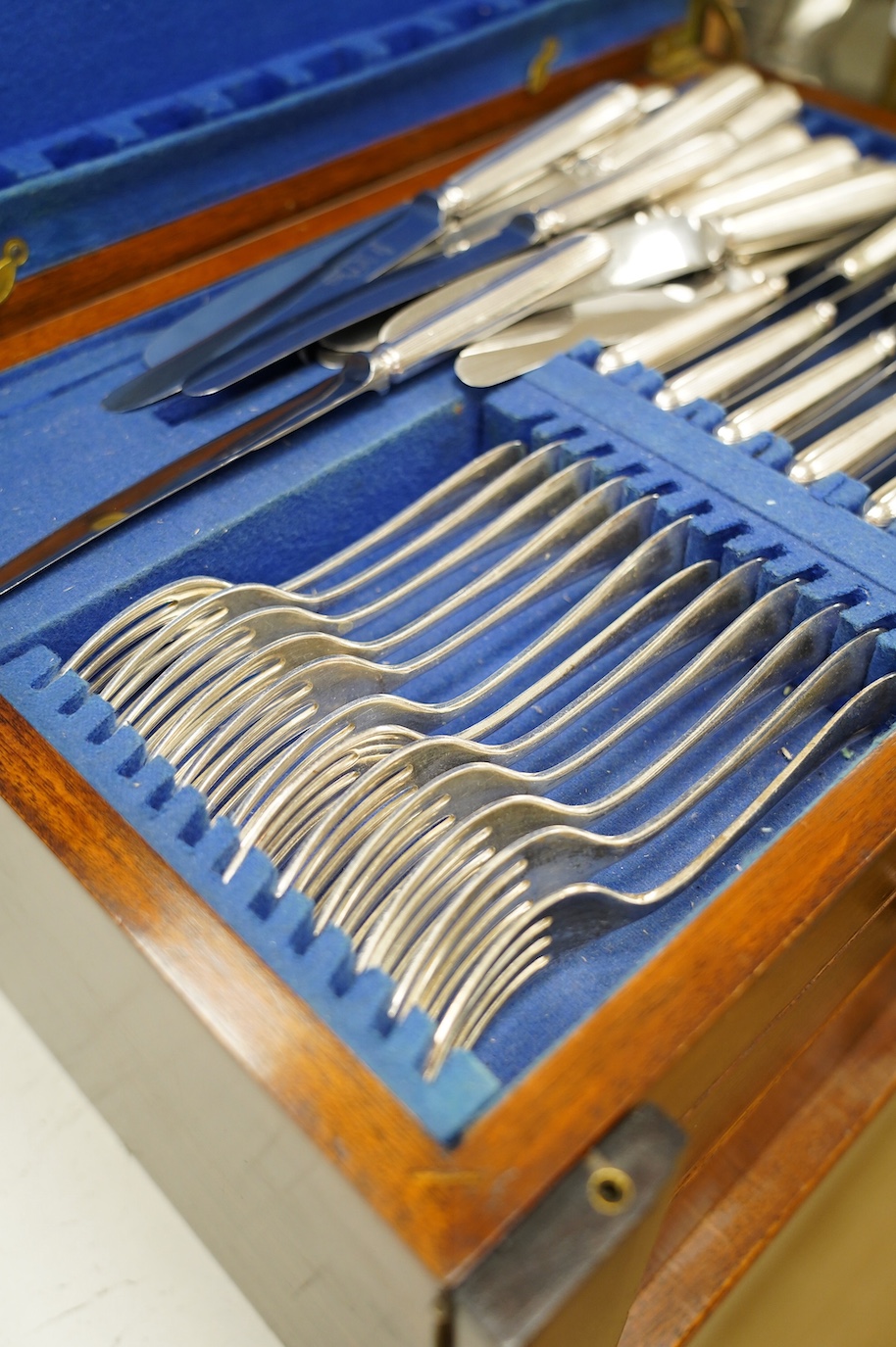 A 1930's mahogany cased canteen of Old English pattern flatware, canteen 45.5cm wide. Condition - case fair, flatware good
